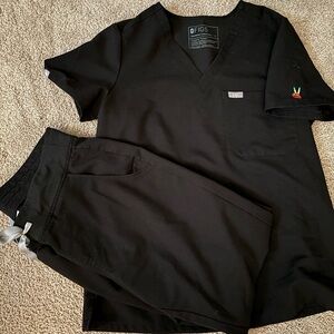 FIGS Zamora pants and Catarine top with rainbow embroidery